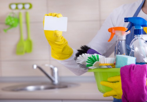 Professional office cleaners working in a Lambeth workplace