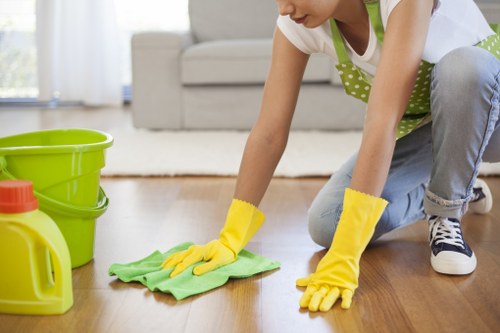 Team following health and safety procedures in a cleaning environment